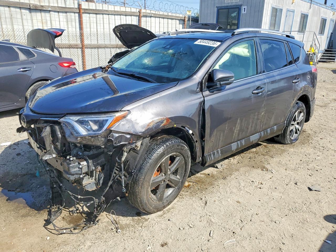 2016 TOYT Rav4 VIN JTMWFREV9GJ092909 photo 1