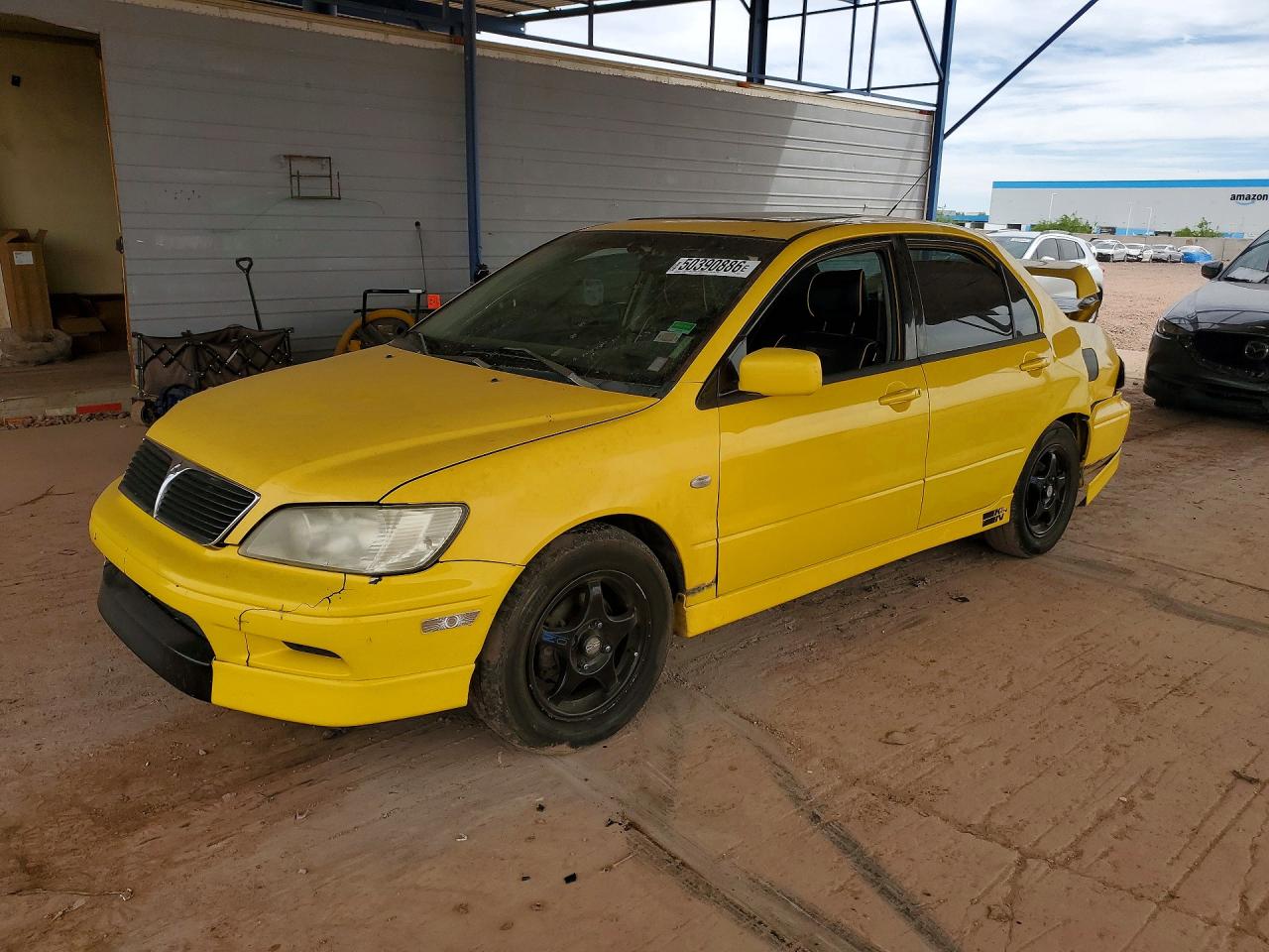 2002 Mitsubishi Lancer VIN JA3AJ86E52U063821 photo 1