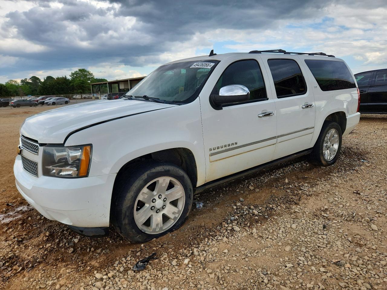 2013 Chevrolet Suburban VIN 1GNSKKE79DR166448 photo 1