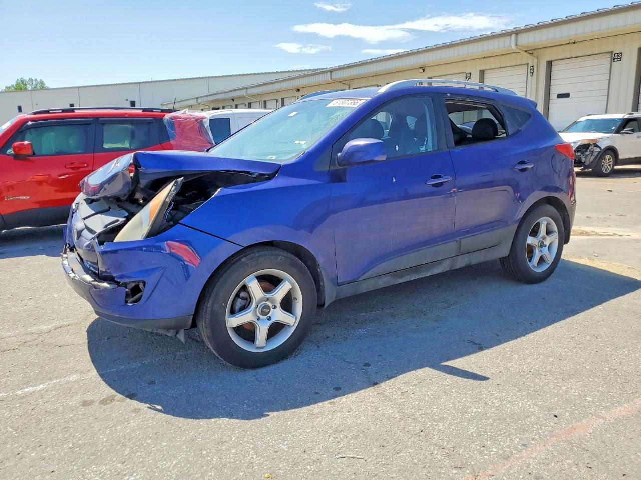 2011 Hyundai Tucson VIN KM8JU3AC0BU129124 photo 1