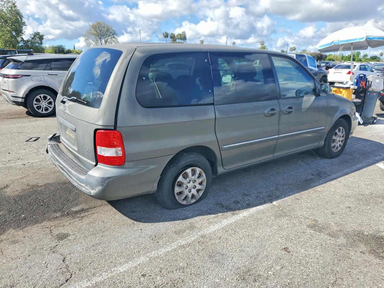 2004 Kia SEDONA VIN KNDUP131946582223 photo 3