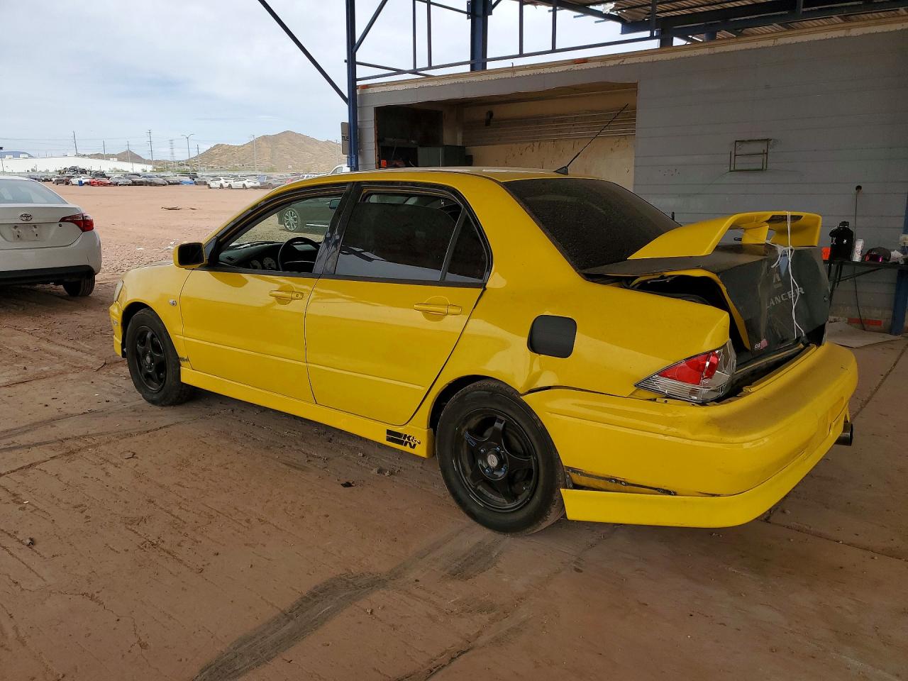 2002 Mitsubishi Lancer VIN JA3AJ86E52U063821 photo 2