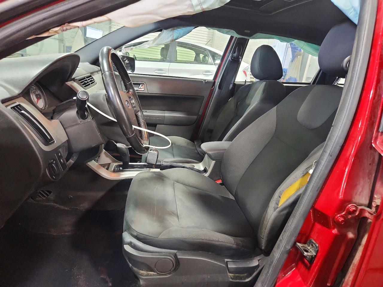 2009 Ford Focus VIN 1FAHP36N79W263847 photo 7