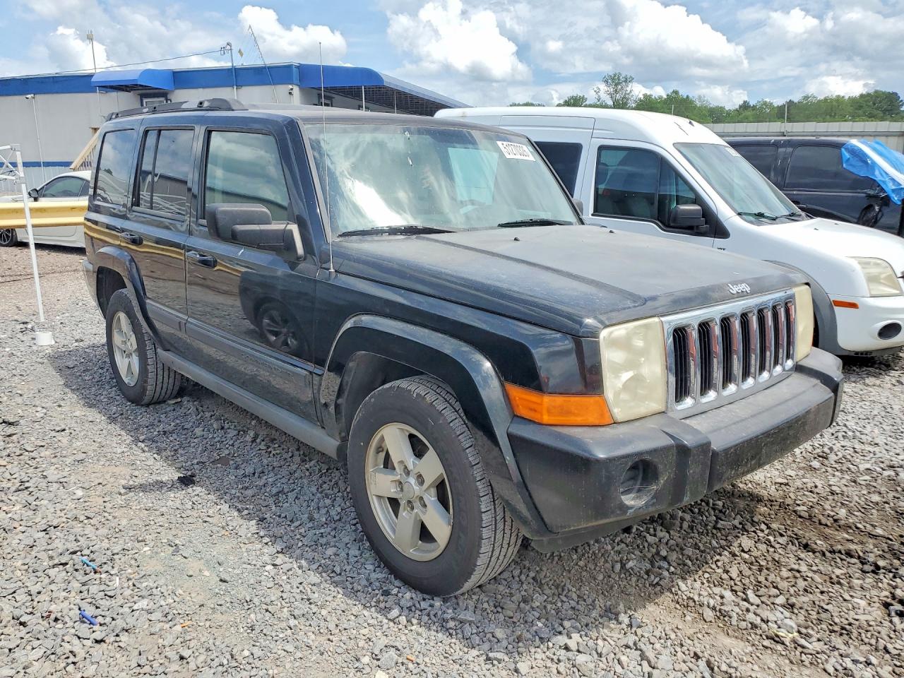 2007 Jeep Commander VIN 1J8HH48KX7C511757 photo 4