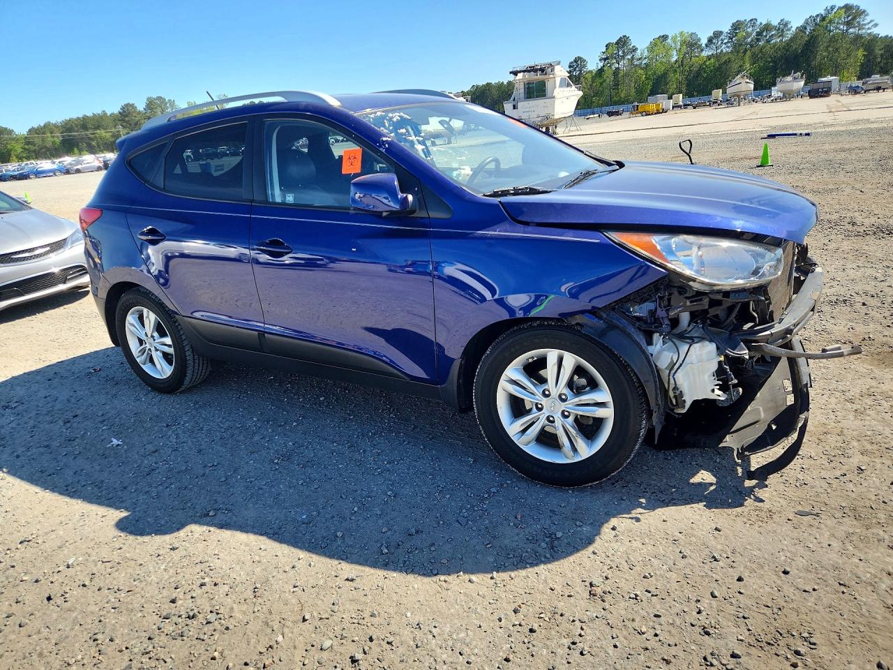 2011 Hyundai Tucson VIN KM8JU3AC6BU207857 photo 4