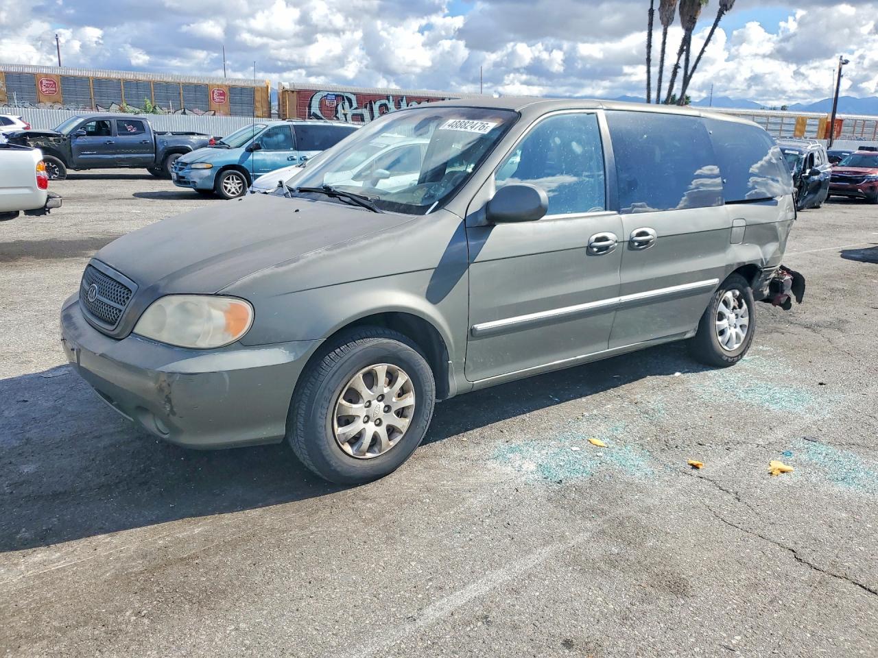 2004 Kia SEDONA VIN KNDUP131946582223 photo 1