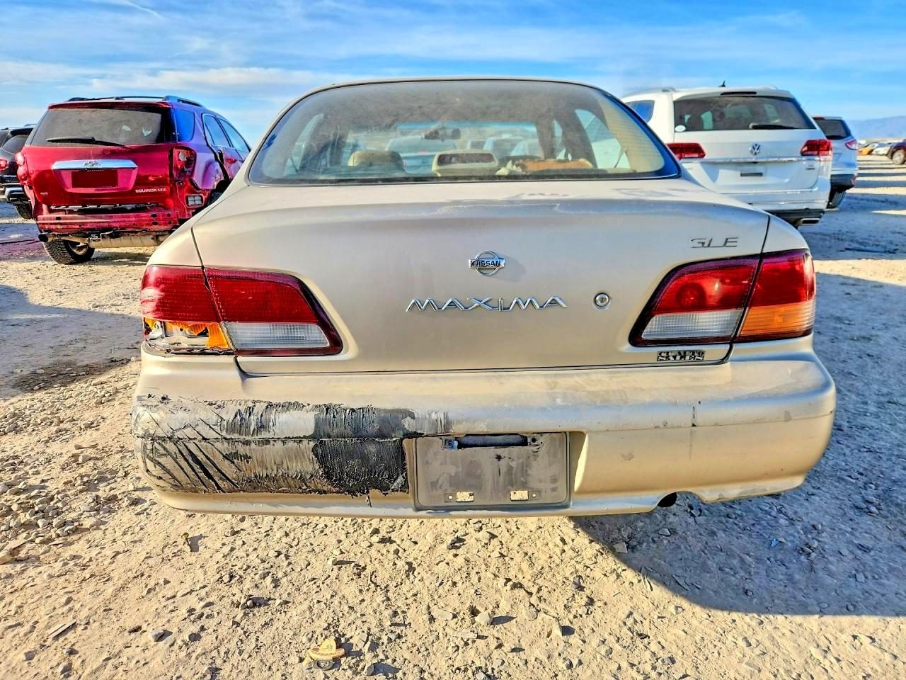 1999 Nissan Maxima VIN JN1CA21AXXT104682 photo 6