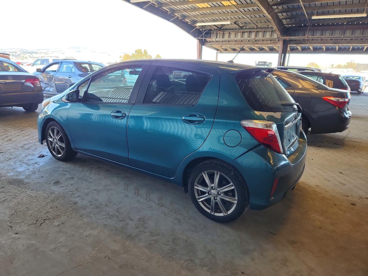 2012 Toyota Yaris VIN JTDKTUD36CD515643 photo 2