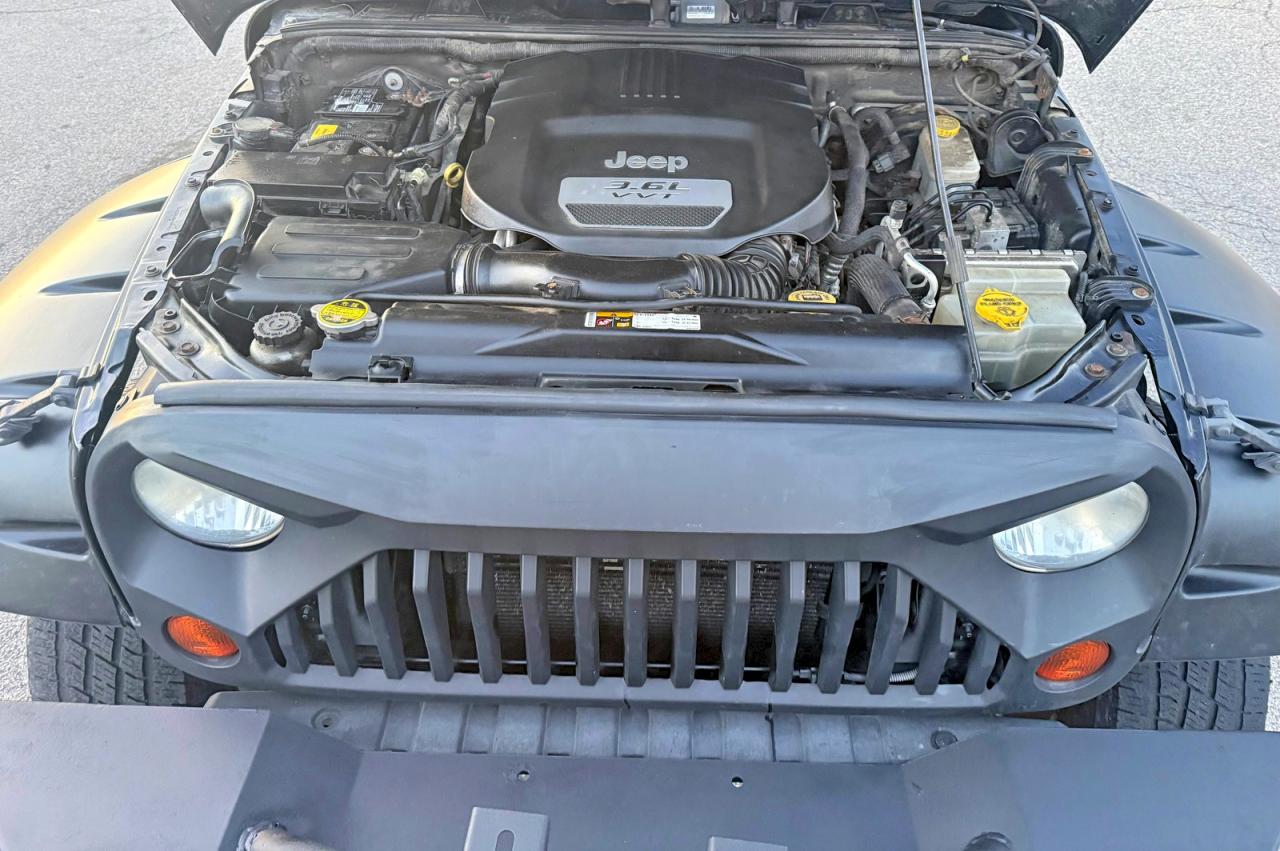 2013 Jeep Wrangler / VIN 1C4BJWFG0DL516764 photo 7