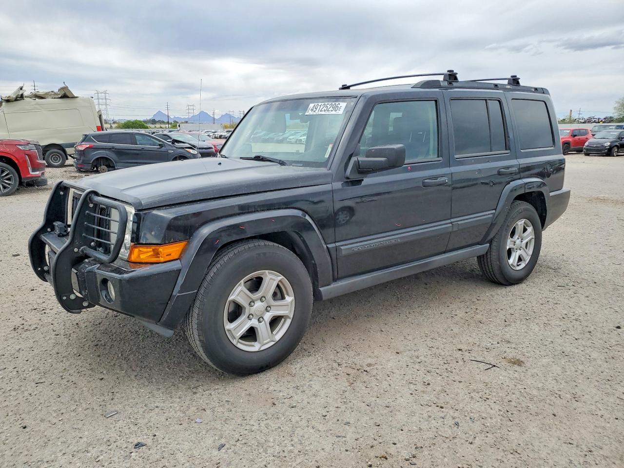 2006 Jeep Commander VIN 1J8HH48NX6C253619 photo 1