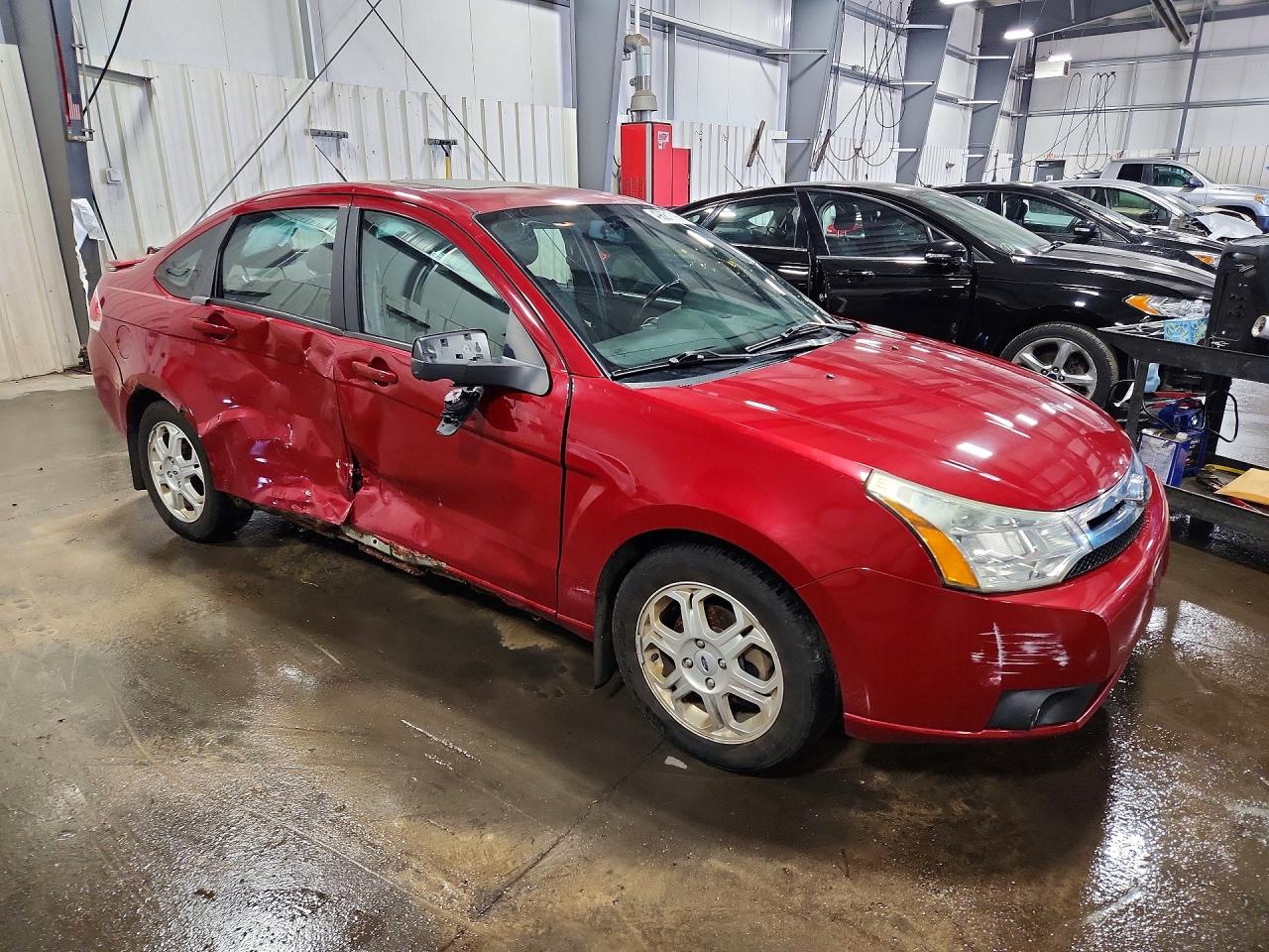 2009 Ford Focus VIN 1FAHP36N79W263847 photo 4