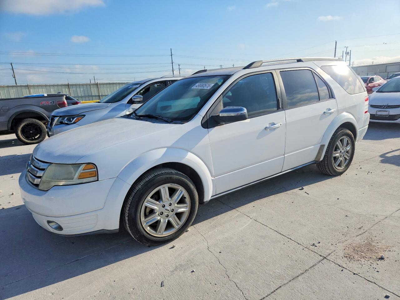 2008 Ford Taurus VIN 1FMDK03W68GA10400 photo 1