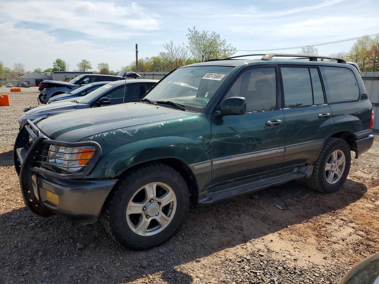 2000 Toyota Land cruis VIN JT3HT05J9Y0094228 photo 1