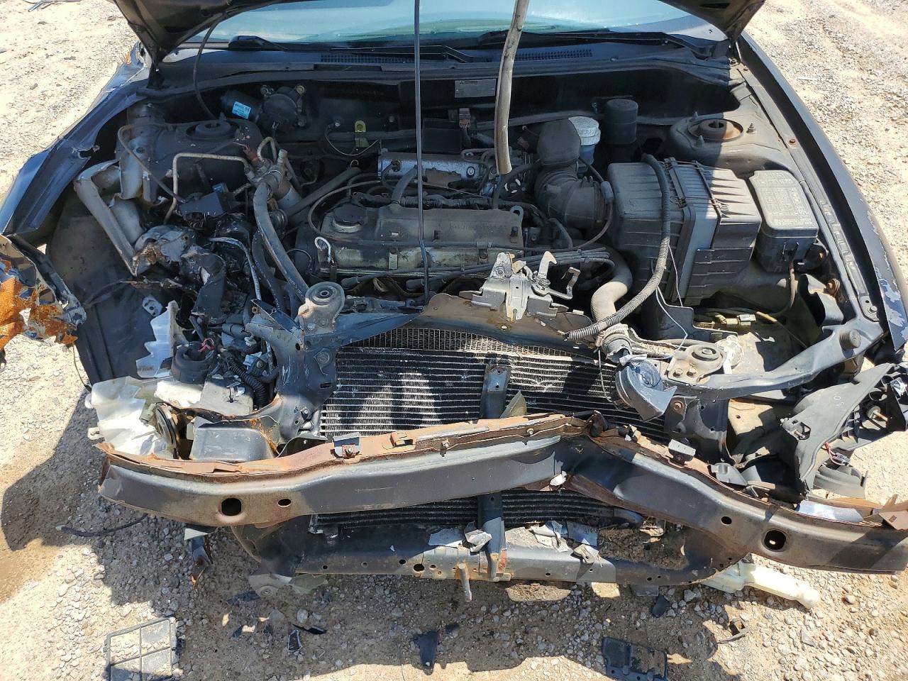 1999 Mitsubishi Mirage VIN JA3AY11A0XU034516 photo 11