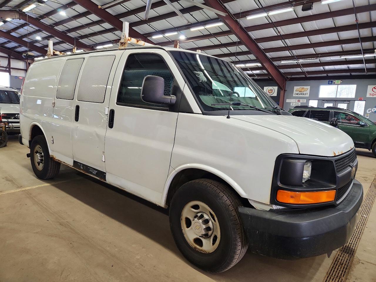 2014 CHEV Express VIN 1GCWGFCA4E1123119 photo 4