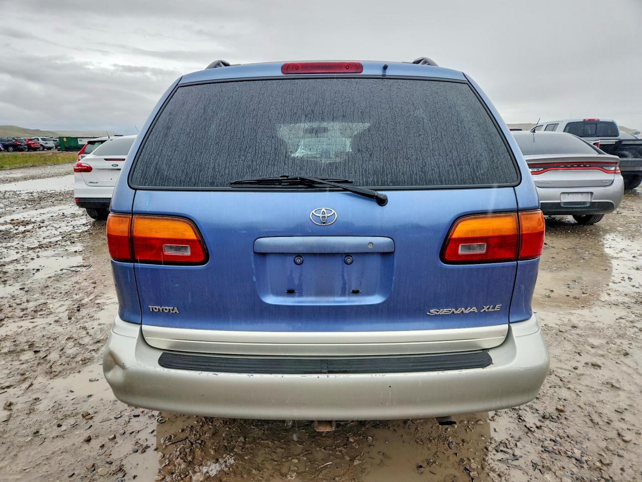 1999 Toyota Sienna VIN 4T3ZF13C6XU163890 photo 6