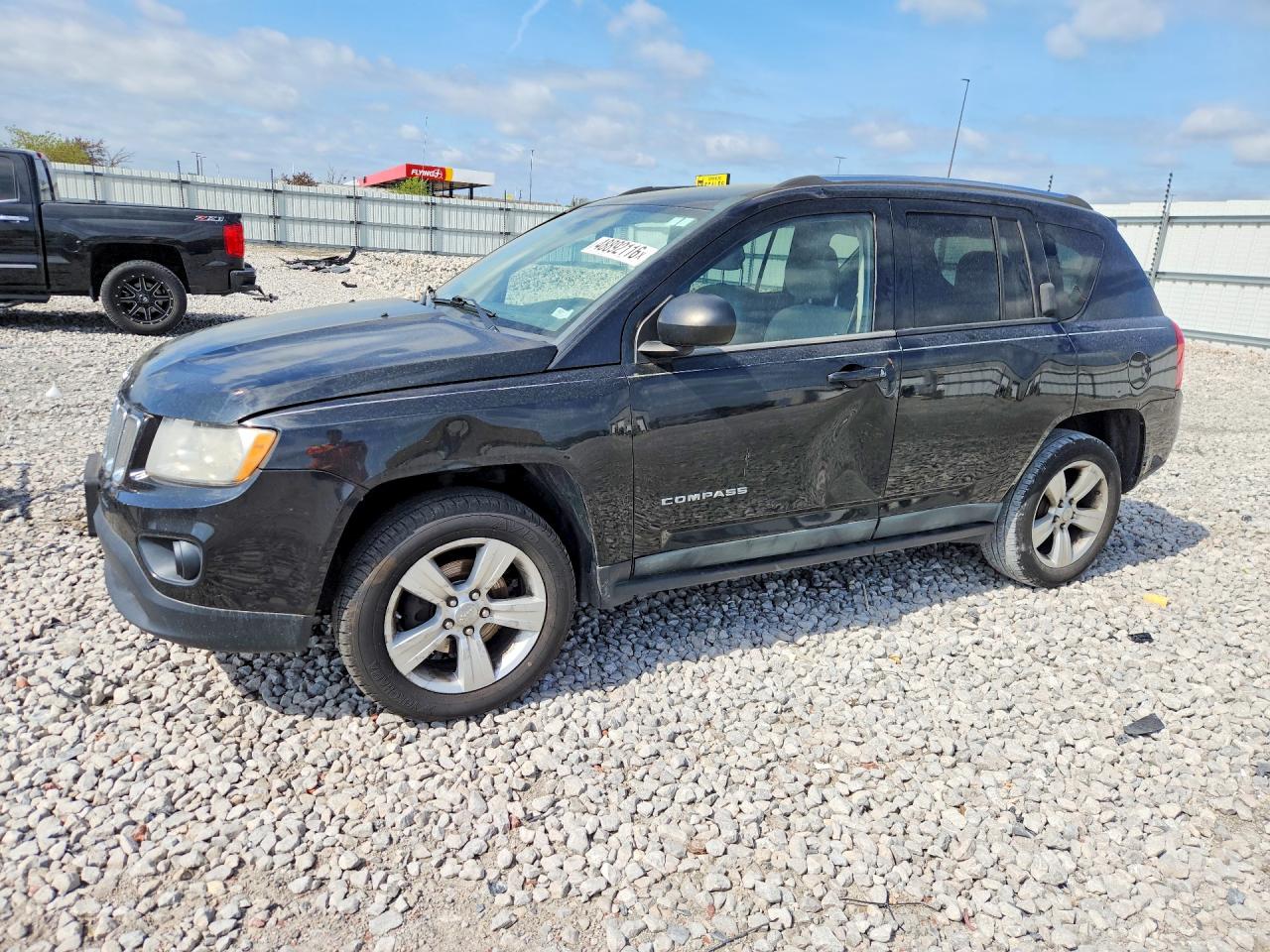 2011 Jeep Compass VIN 1J4NT1FB4BD155765 photo 1
