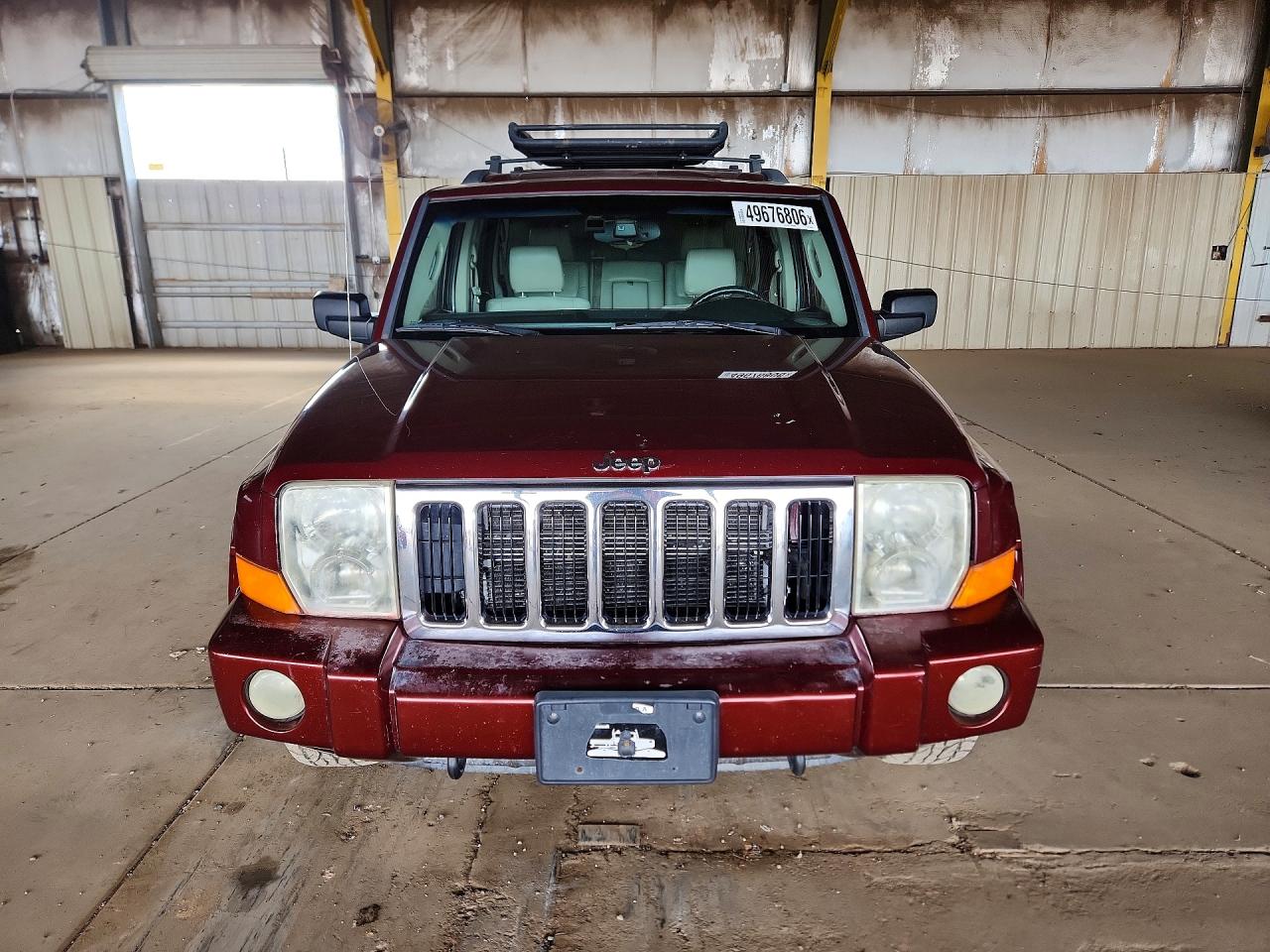 2007 Jeep Commander VIN 1J8HG58207C530195 photo 5