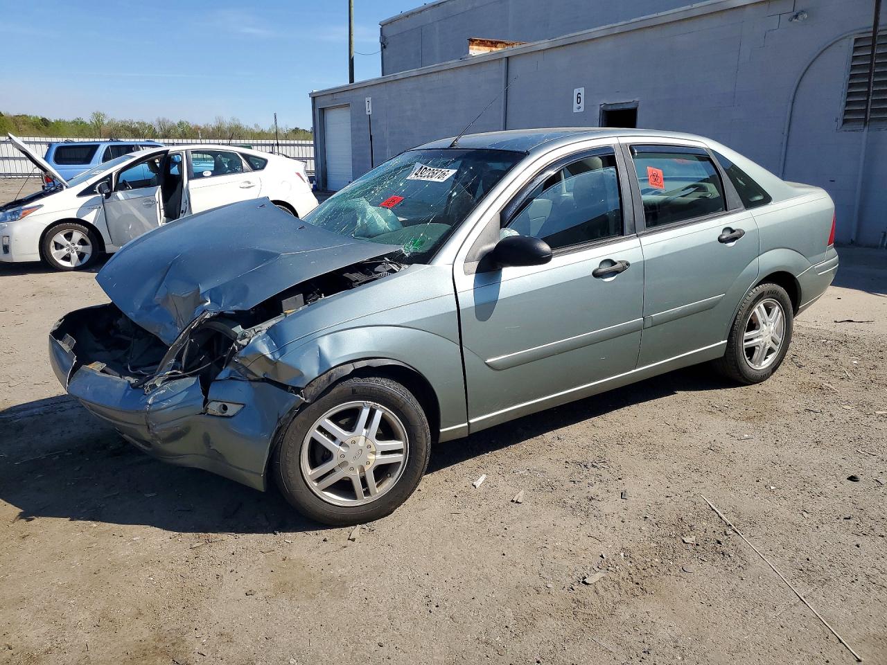 2003 Ford Focus VIN 1FAFP34333W158139 photo 1