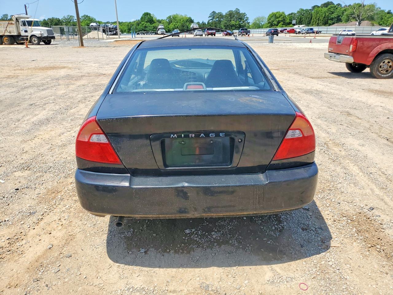 1999 Mitsubishi Mirage VIN JA3AY11A0XU034516 photo 6