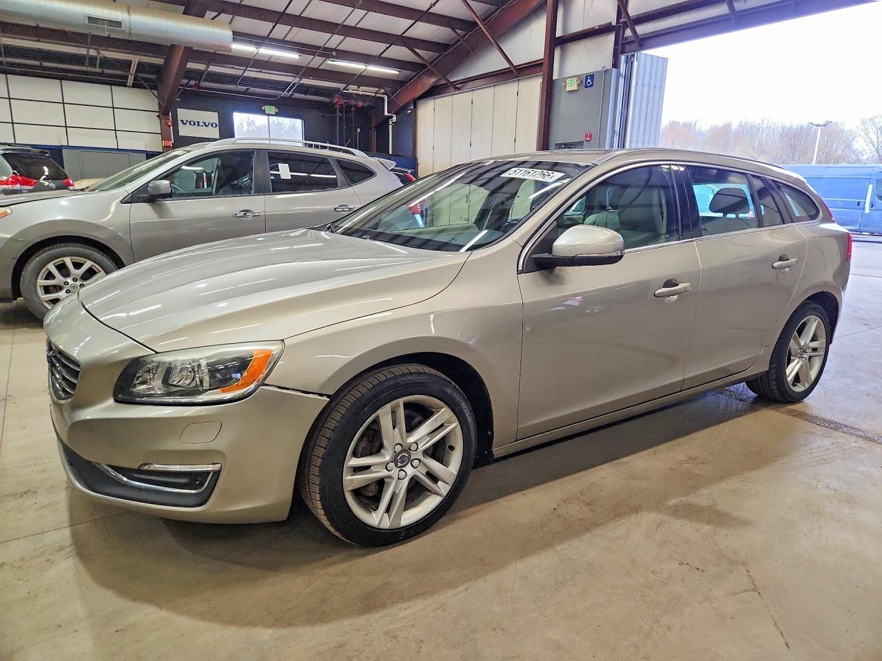 2015 Volvo V60 VIN YV1612SM9F1267136 photo 1