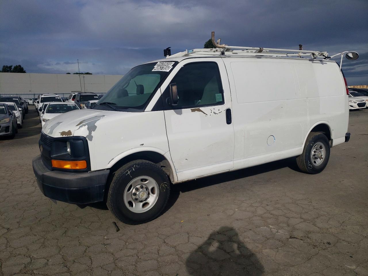 2012 CHEV Express VIN 1GCWGFCA6C1181424 photo 1