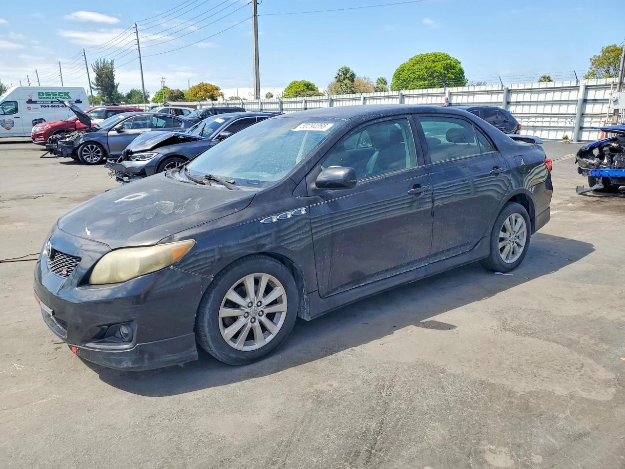 2009 TOYT Corolla VIN 1NXBU40E99Z142428 photo 1