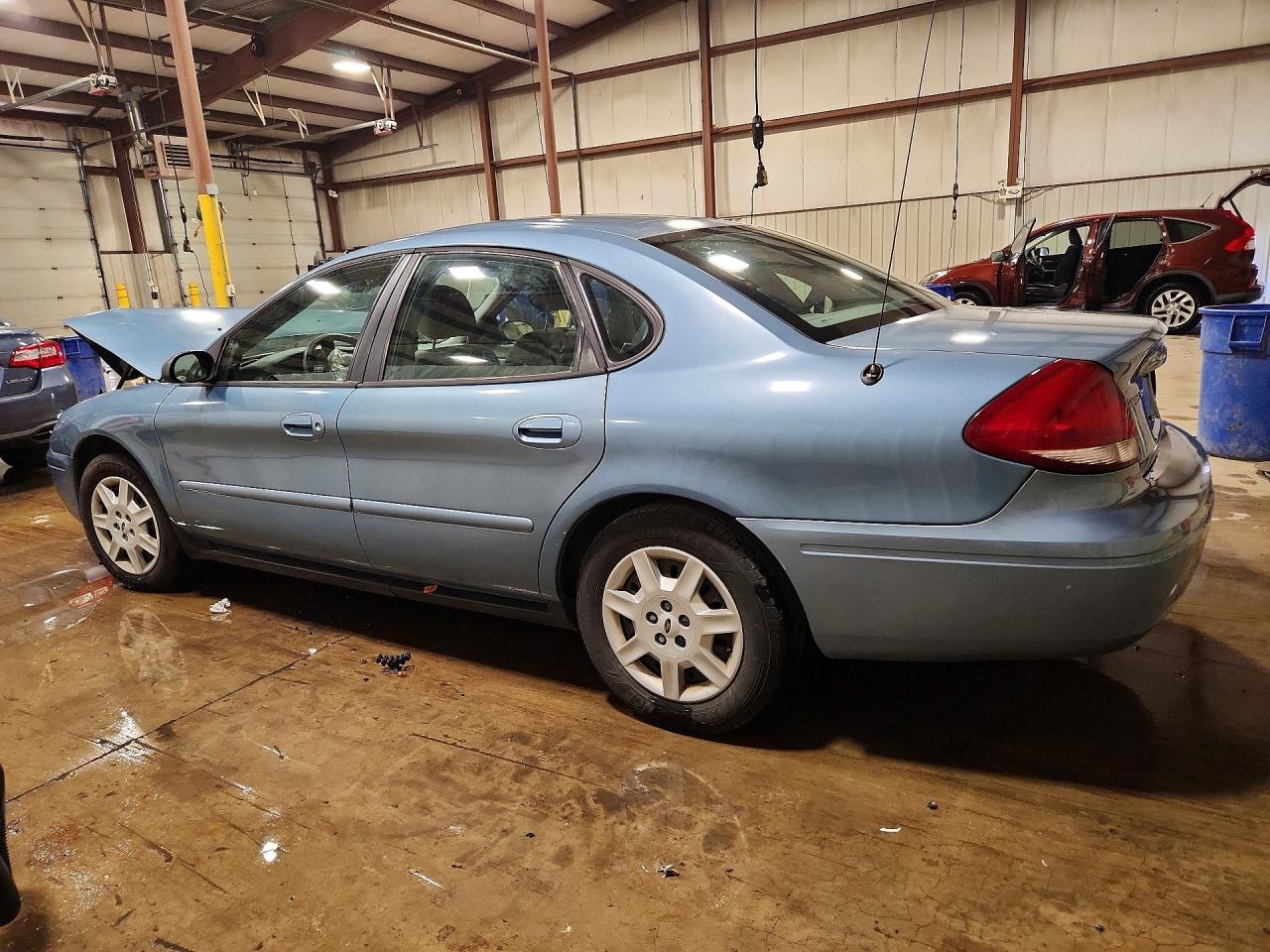 2007 Ford Taurus VIN 1FAFP53U87A164401 photo 2