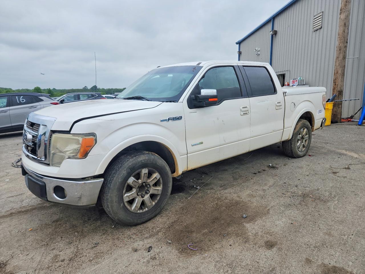 2011 Ford F150 VIN 1FTFW1CTXBFC63147 photo 1