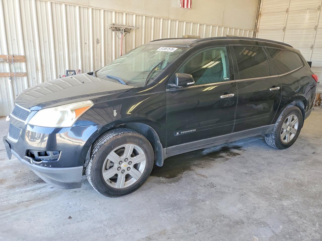 2009 Chevrolet Traverse VIN 1GNER23D09S125224 photo 1