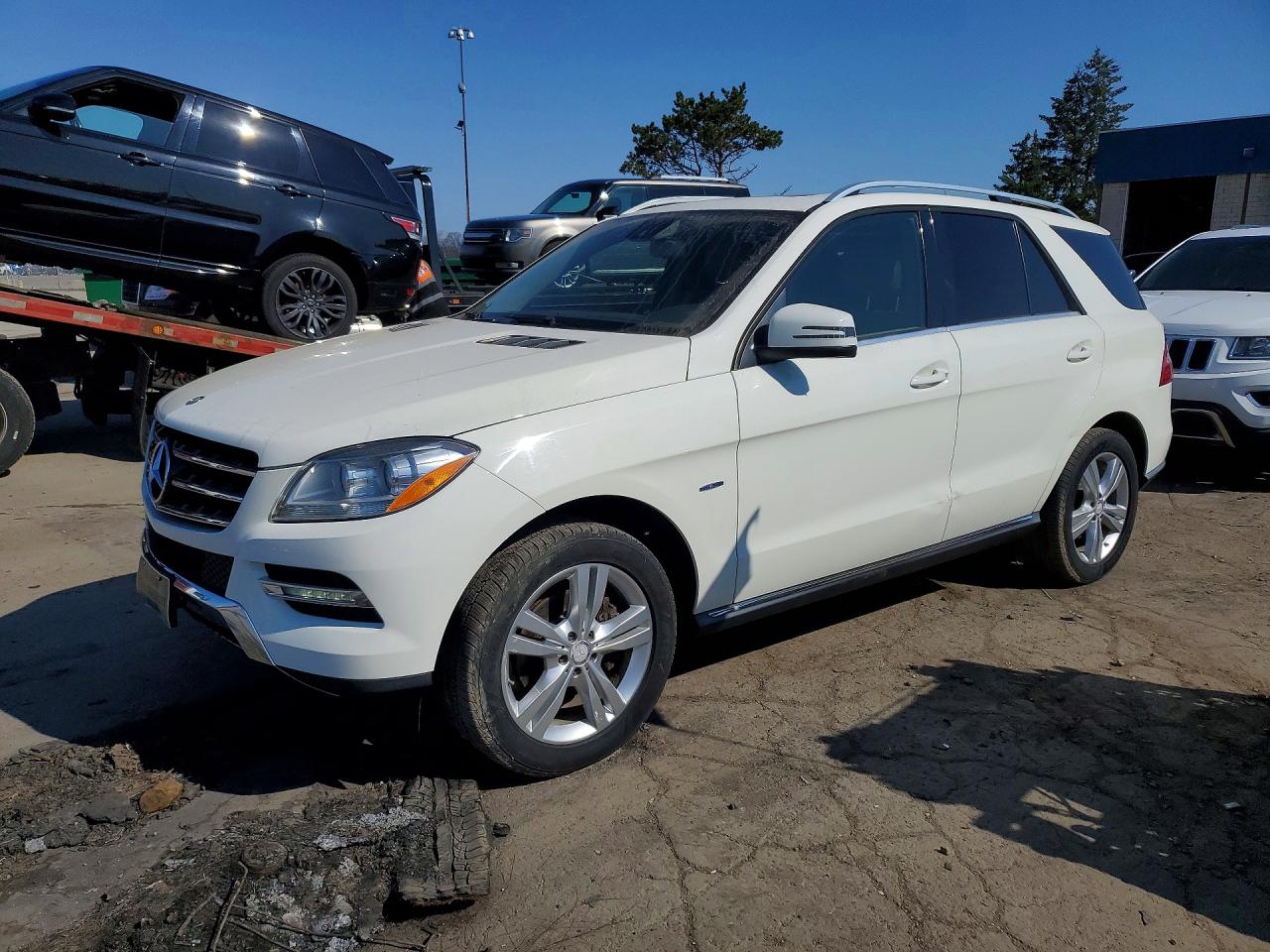 2012 Mercedes-Benz M-class VIN 4JGDA5HB7CA031595 photo 1