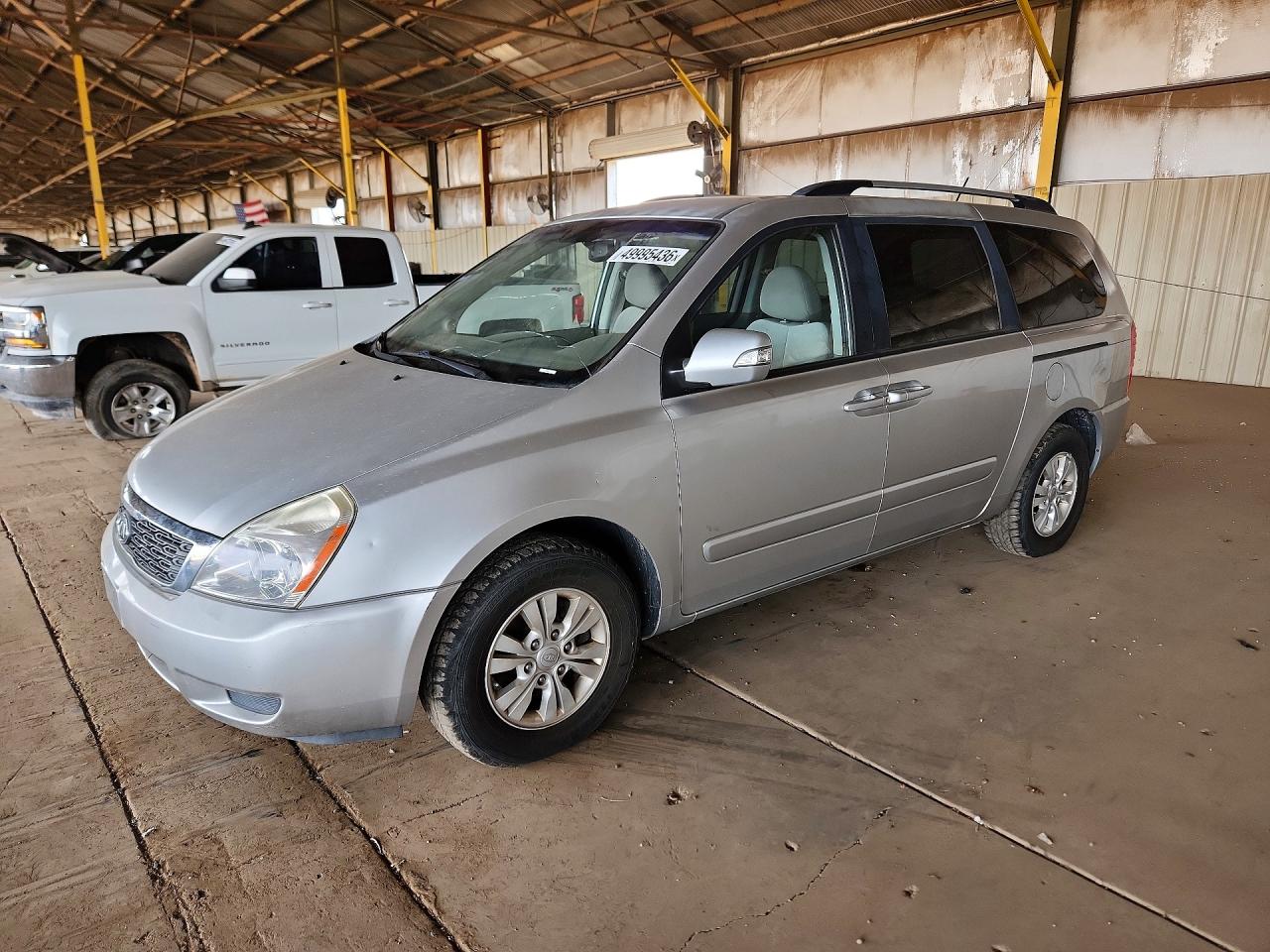 2012 Kia SEDONA VIN KNDMG4C79C6434092 photo 1