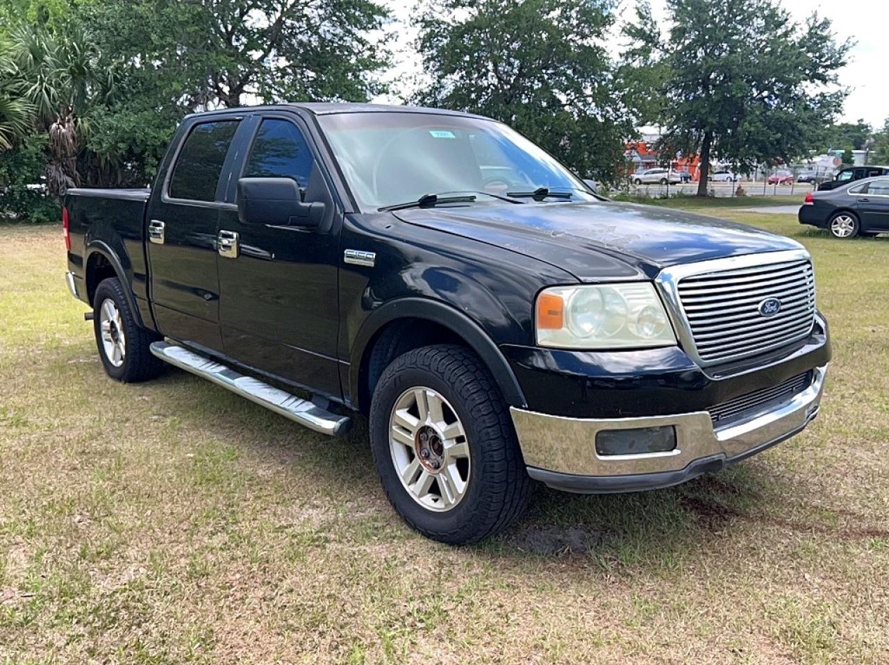 2005 Ford F150 VIN 1FTPW12575KE12987 photo 1