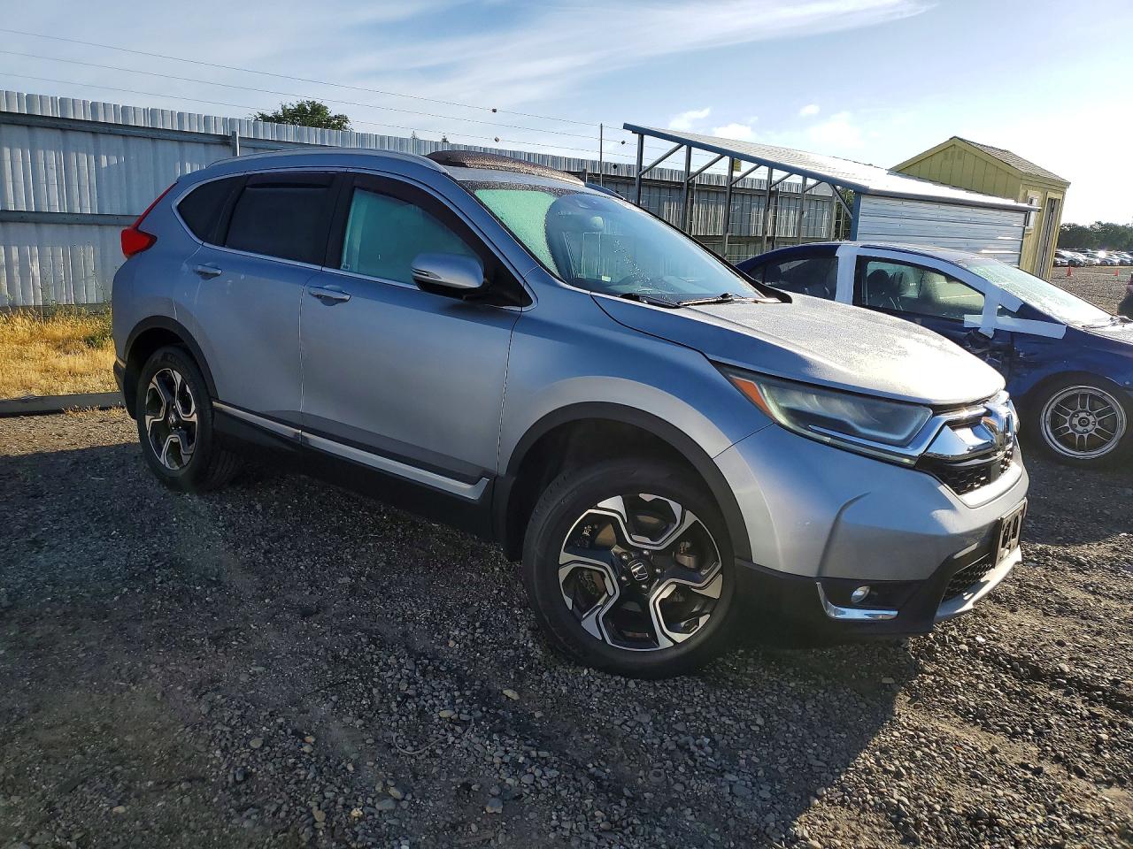 2017 Honda Crv VIN 7FARW1H91HE040894 photo 4