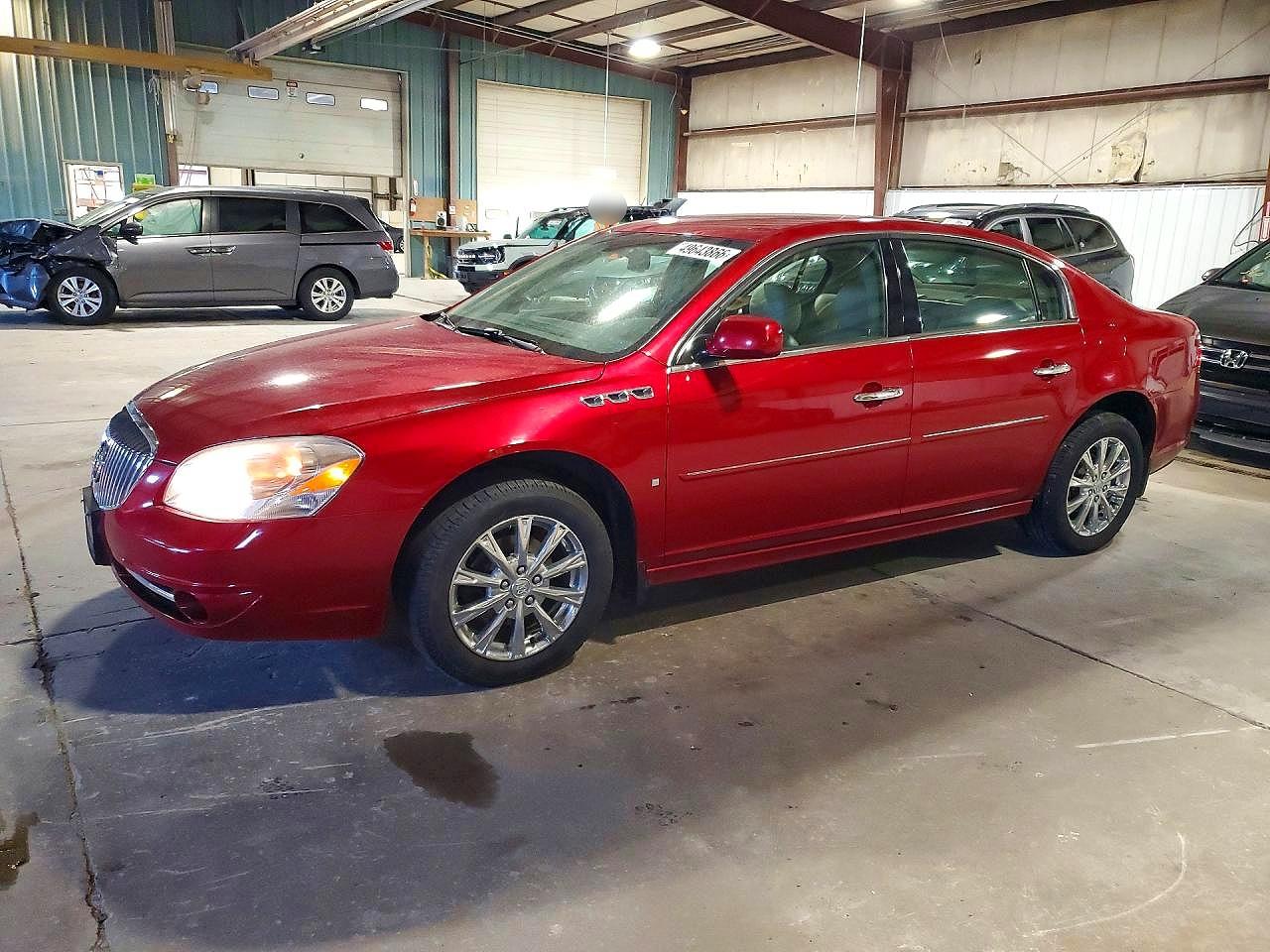 2010 Buick Lucerne VIN 1G4HC5EMXAU109400 photo 1