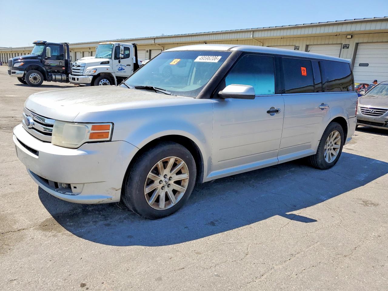 2009 Ford Flex VIN 2FMEK62C09BA06866 photo 1
