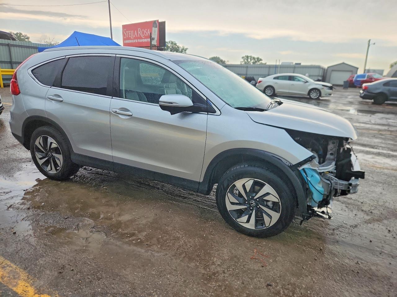 2016 Honda Crv VIN 5J6RM4H91GL105588 photo 4