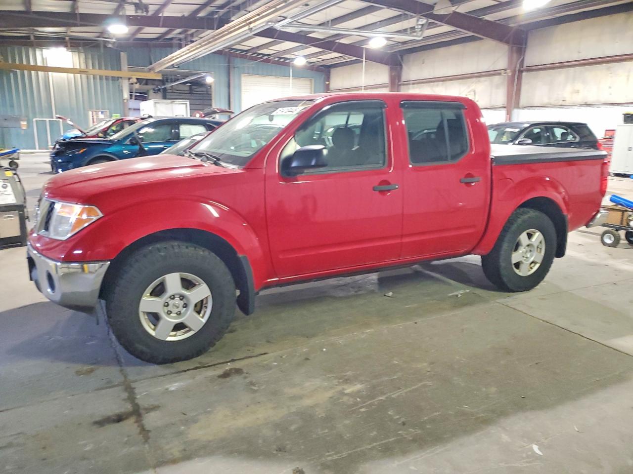 2006 NISS Frontier VIN 1N6AD07W76C476110 photo 1