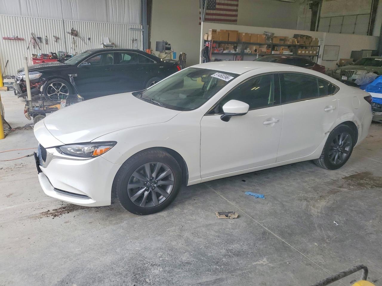 2018 Mazda 6 VIN JM1GL1UM8J1311857 photo 1