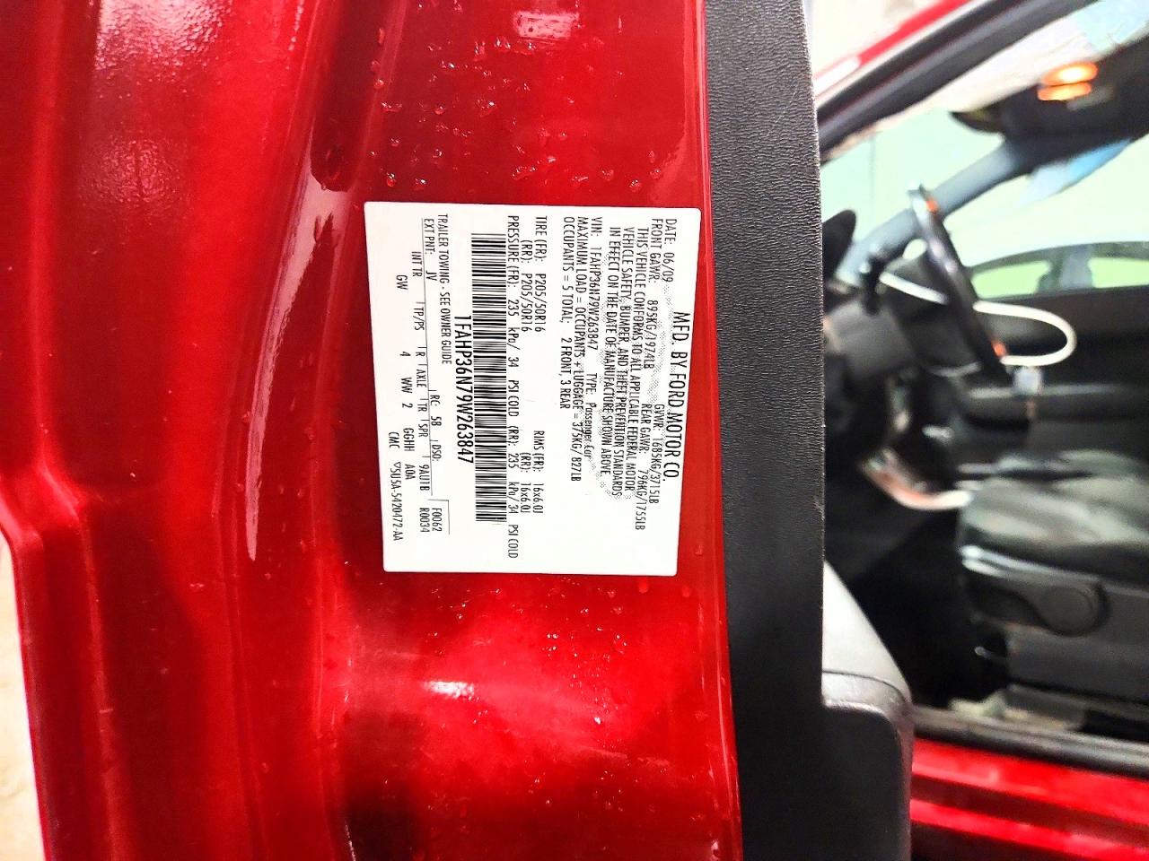 2009 Ford Focus VIN 1FAHP36N79W263847 photo 12