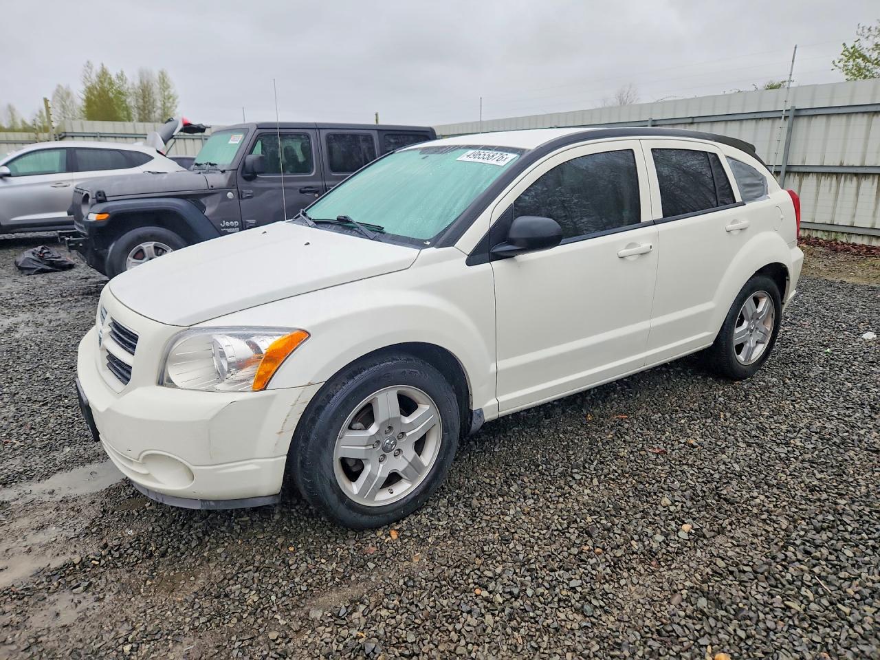 2009 Dodge Caliber VIN 1B3HB48A59D108347 photo 1