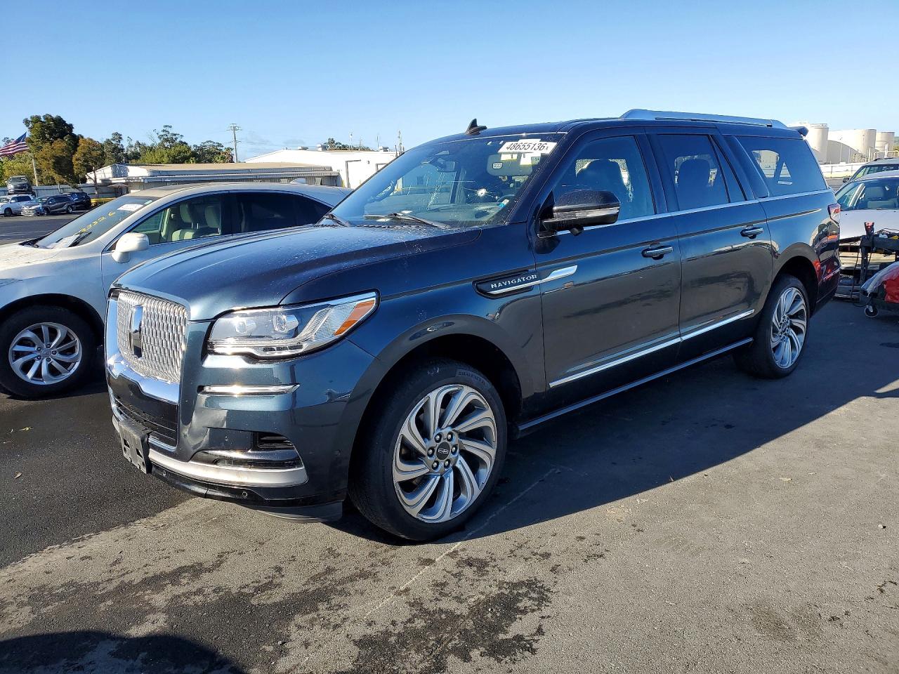 2022 Lincoln Navigator VIN 5LMJJ3LT9NEL01653 photo 1