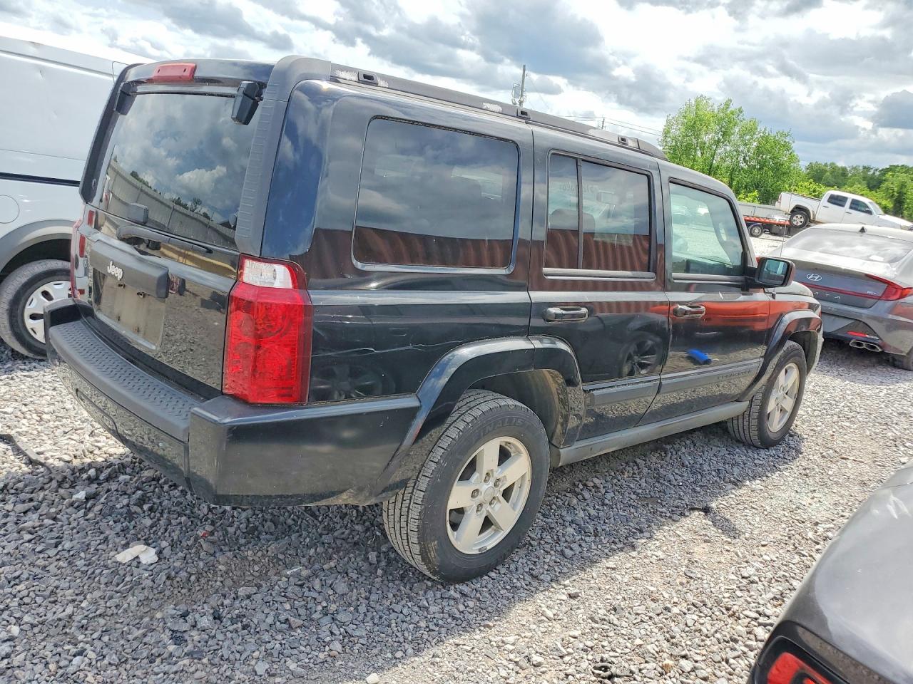 2007 Jeep Commander VIN 1J8HH48KX7C511757 photo 3