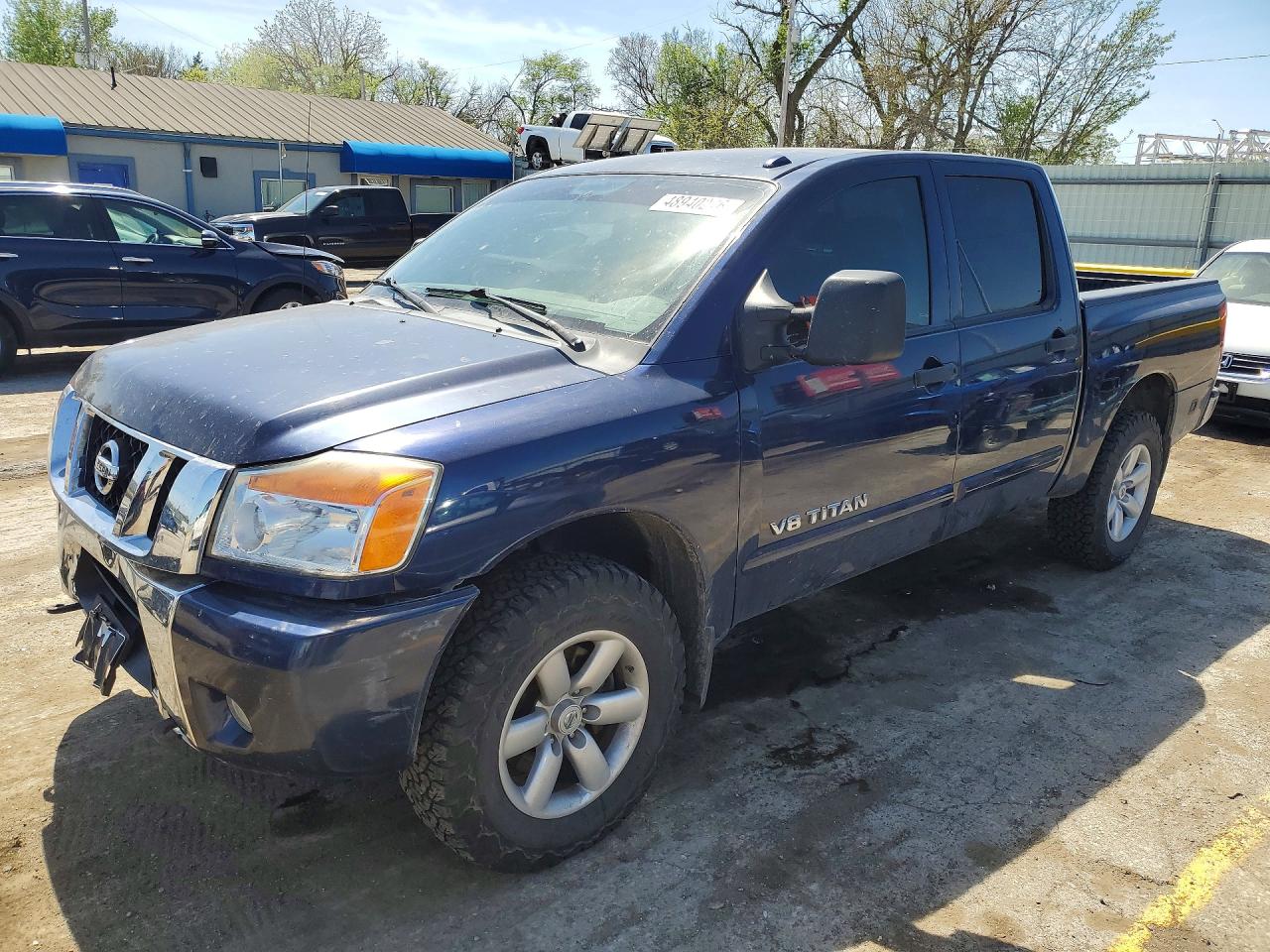2010 Nissan TITAN VIN 1N6BA0ECXAN309260 photo 1