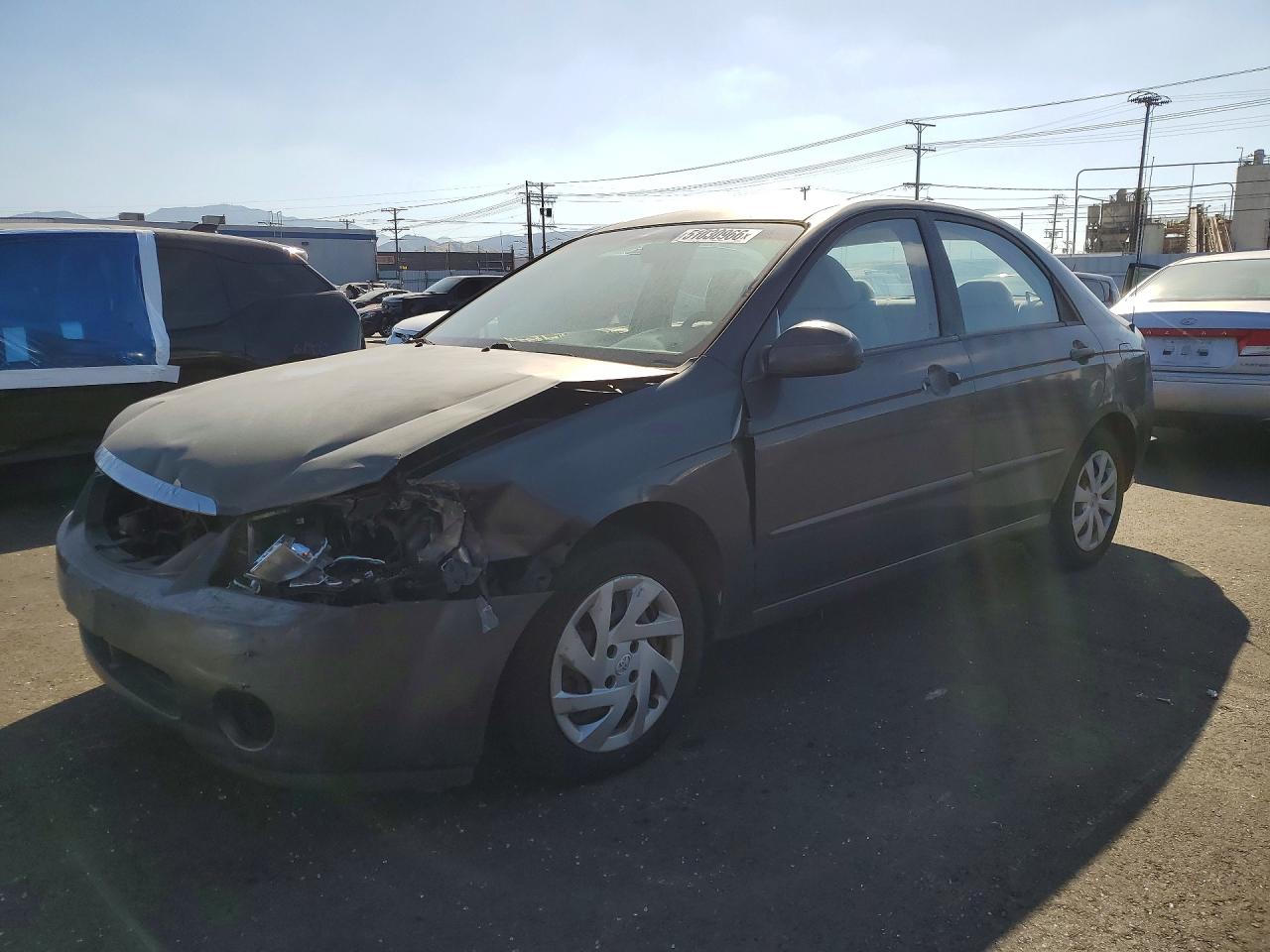 2005 Kia Spectra VIN KNAFE122355204590 photo 1