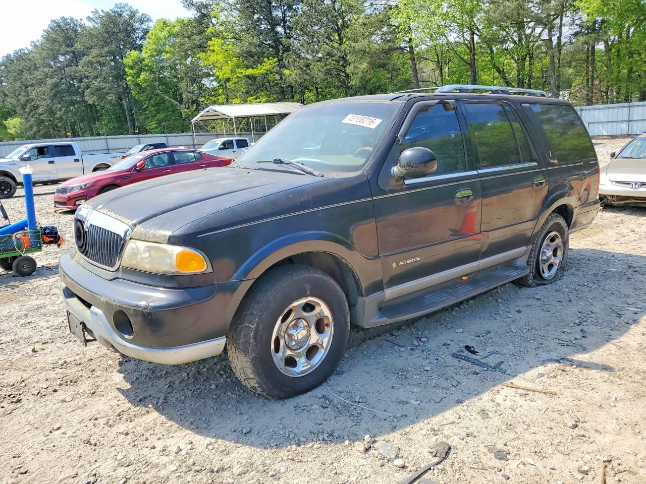 2000 Lincoln Navigator VIN 5LMPU28A9YLJ00290 photo 1