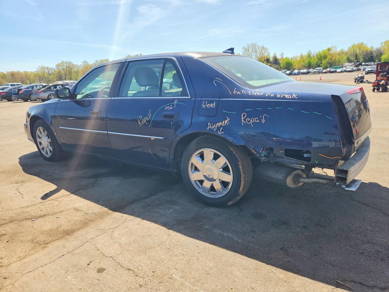 2009 Cadillac Dts VIN 1G6KD57YX9U100203 photo 2