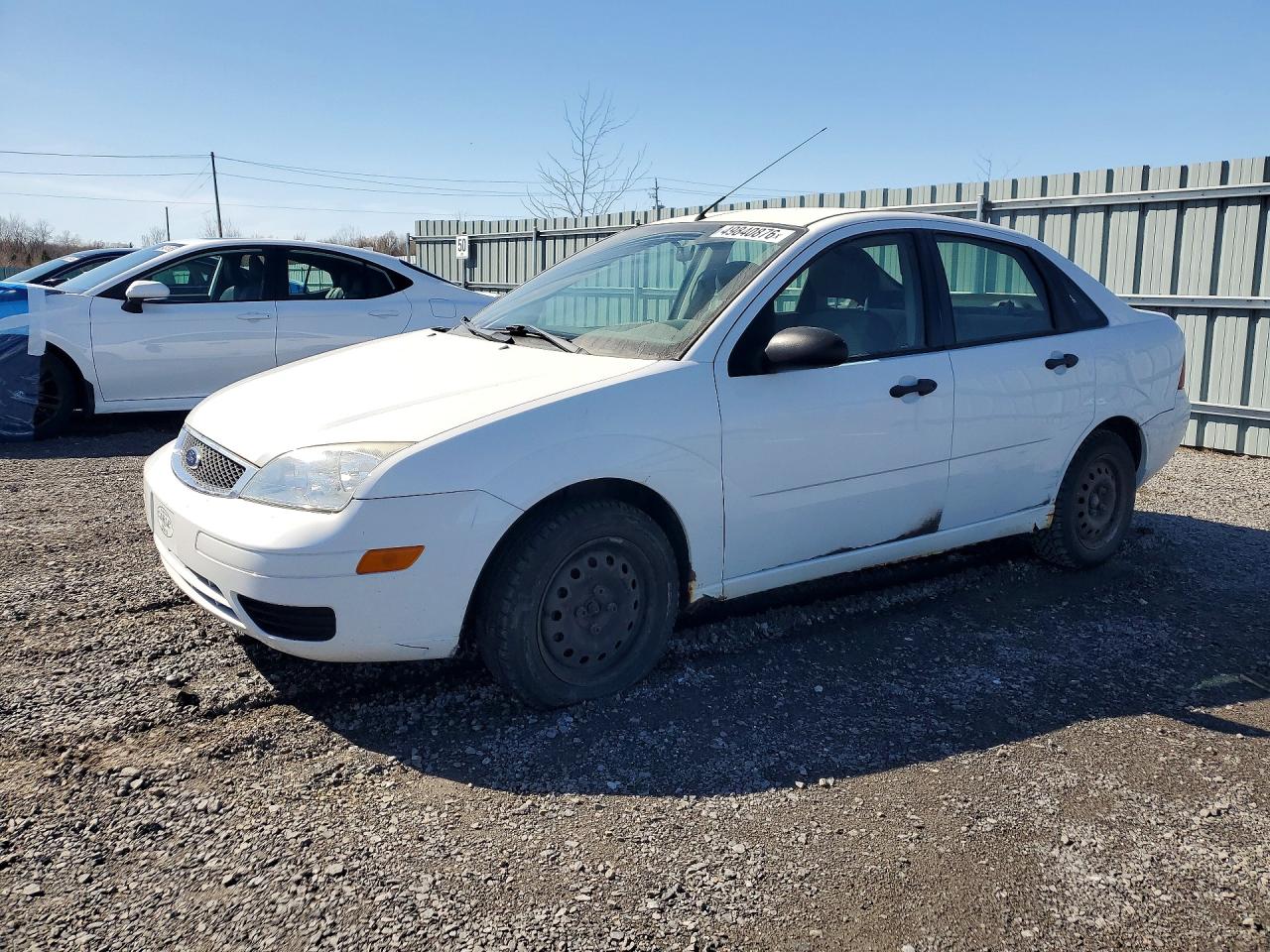 2007 Ford Focus VIN 1FAFP34N27W354435 photo 1
