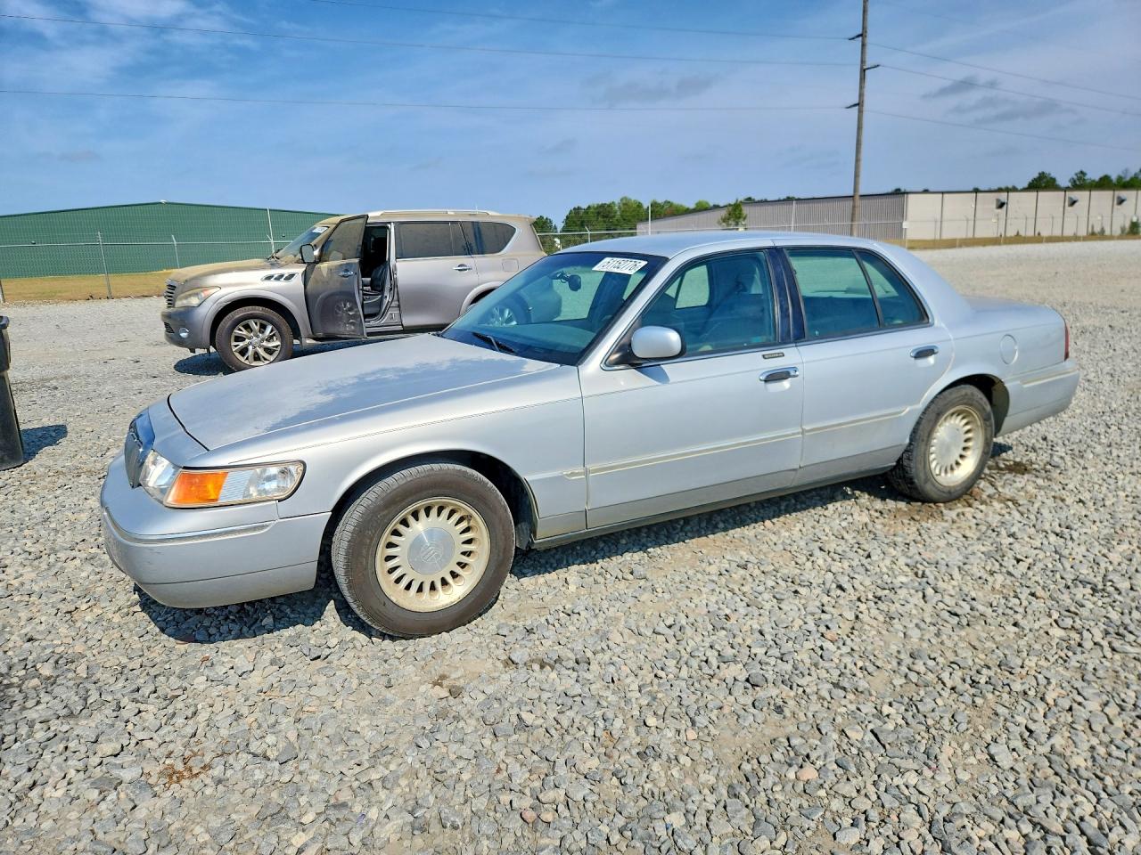 1998 Mercury Grmarquis VIN 2MEFM75W1WX641588 photo 1