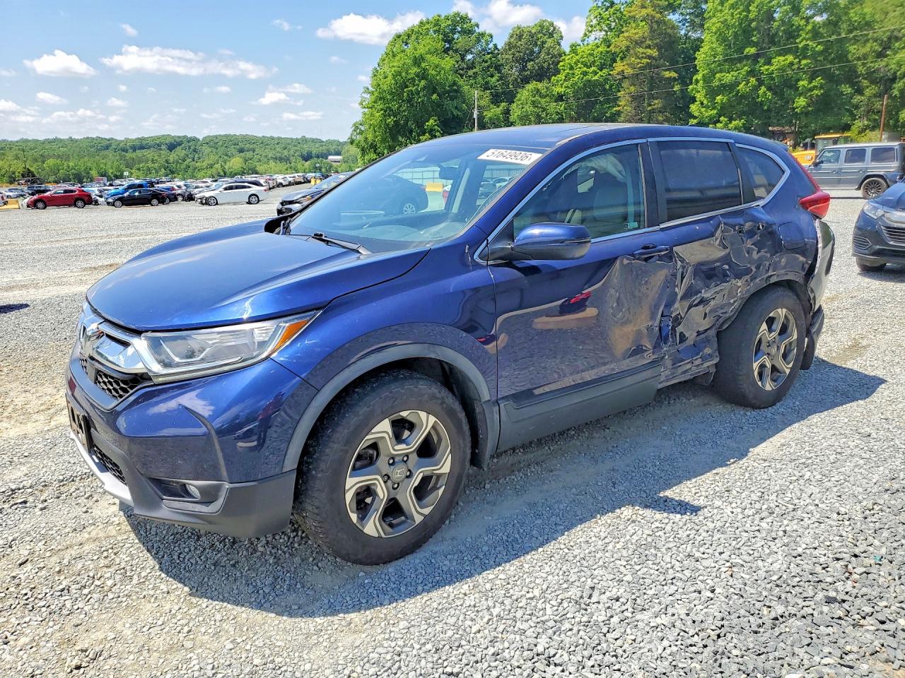 2018 Honda Crv VIN 2HKRW2H59JH661354 photo 1